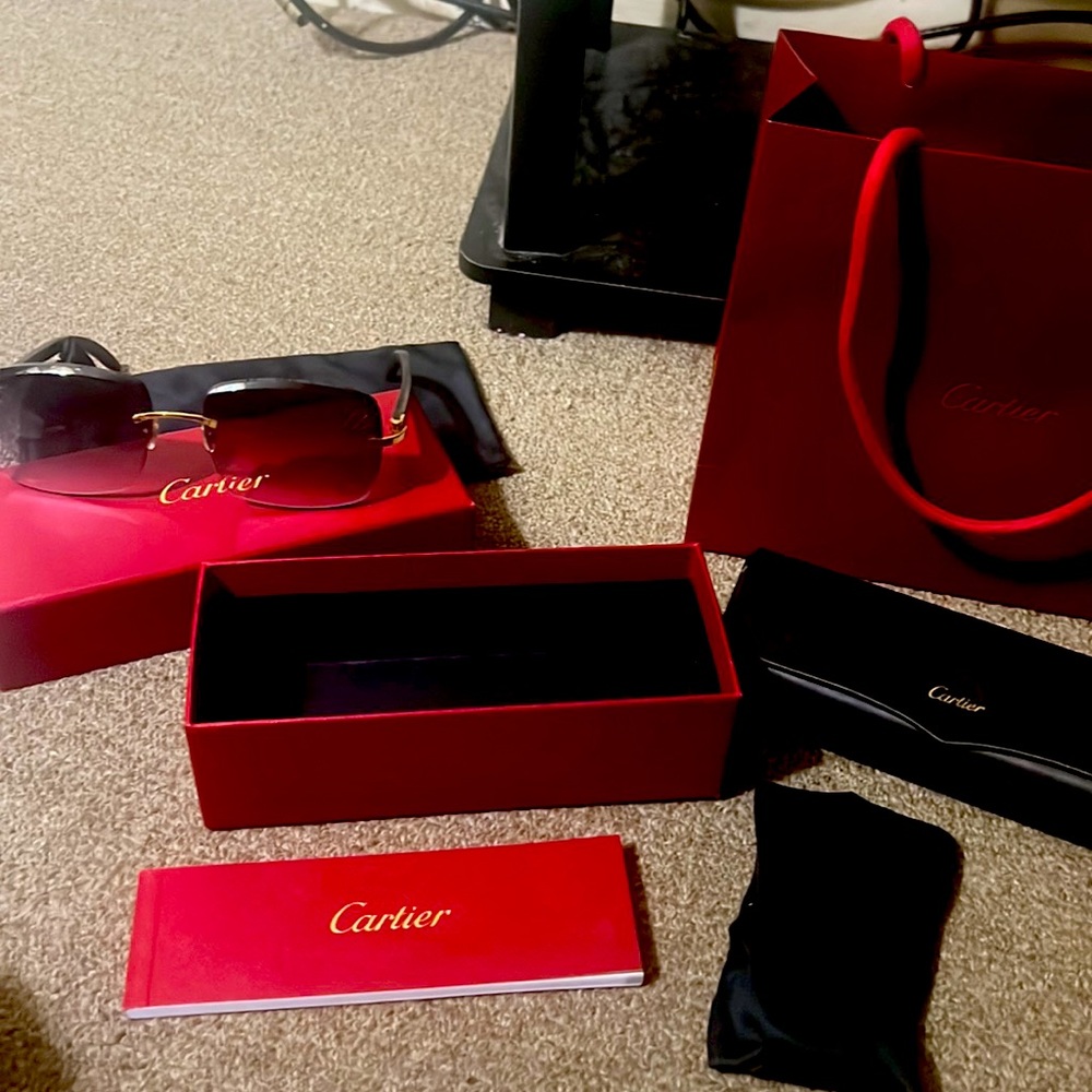 Black buffalo horn Cartier sunglasses w/ Big C special edition lenses